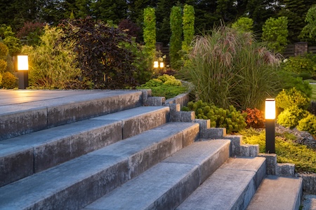 Landscape lighting vs solar path lights what actually works in the midwest